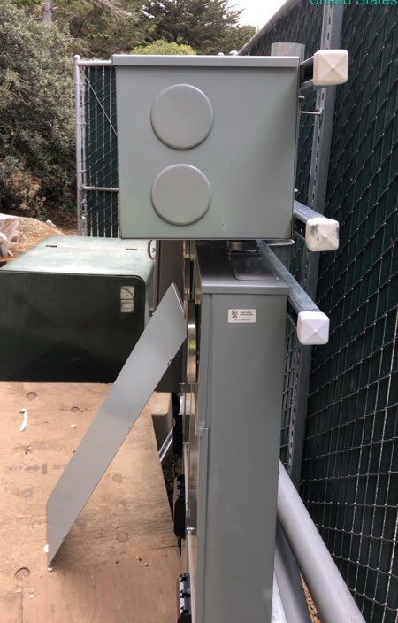 Meter and disconnect equipment mounted at a site